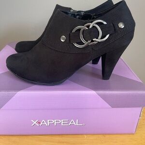 Women’s Booties
X-Appeal Wore one size 7
